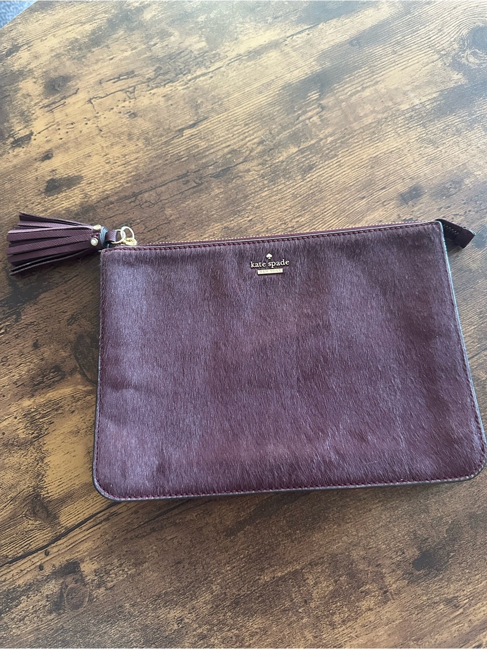 kate spade Plum Haircalf Tassel Zip Clutch